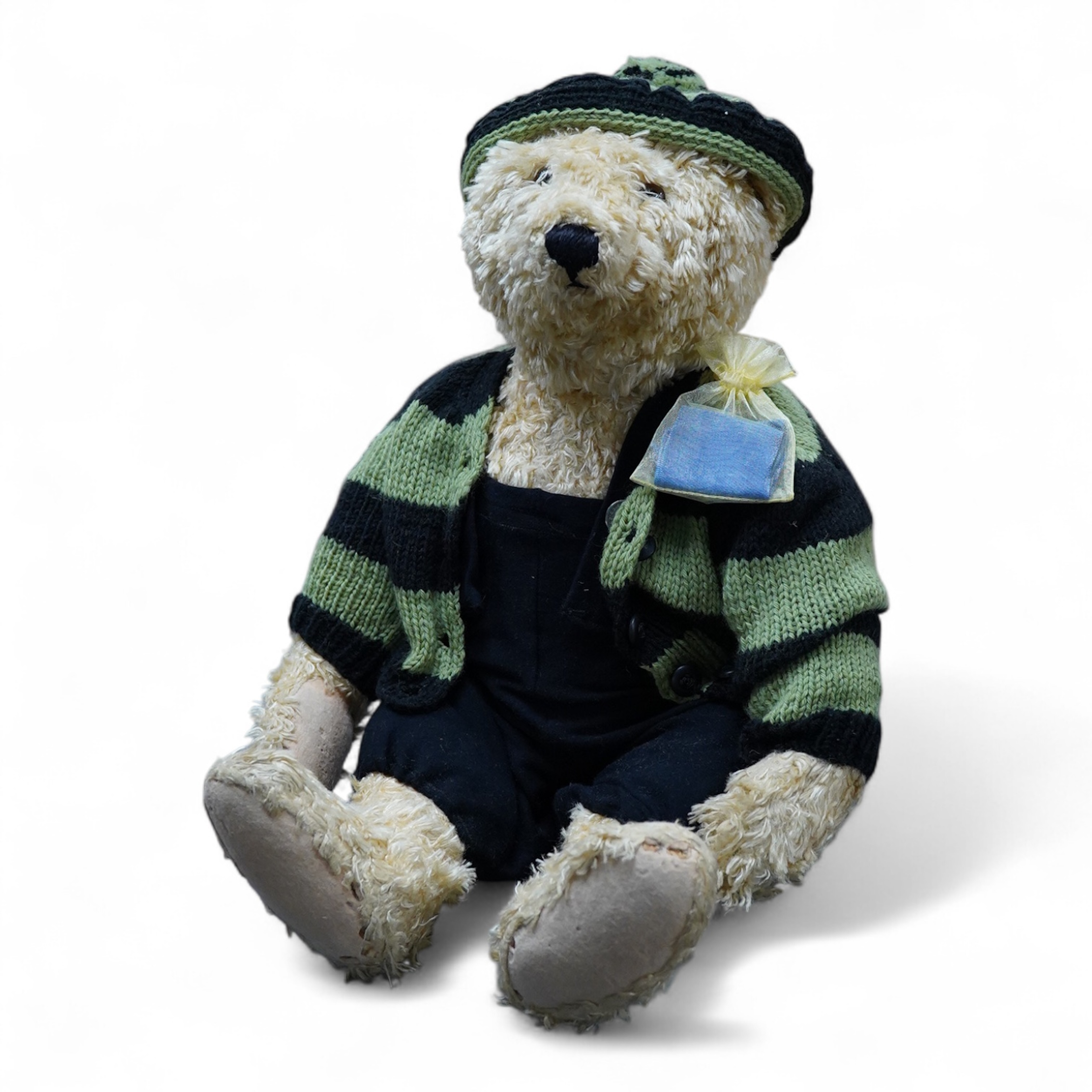 A Steiff artificial silk Teddy bear, (5650.2), jointed blonde body, stitched snout and glass eyes, button in ear, with related book and papers, bear 50cm